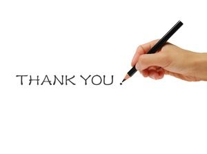Hand holding pencil writing PPT thank you picture