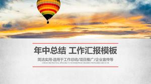 PPT template of year-end work summary work report on sky hot air balloon background
