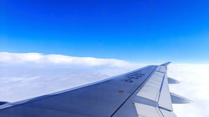 PPT background picture of blue sky and white cloud wing