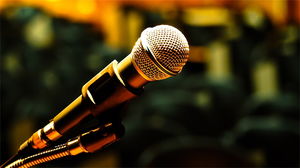 PPT background picture of the microphone under the light