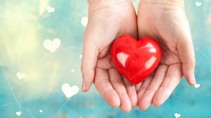 Hand holding love PPT background picture