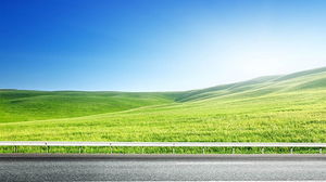 PPT background picture of blue sky and white cloud grass beside the highway